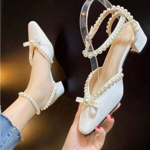 White kitten heels